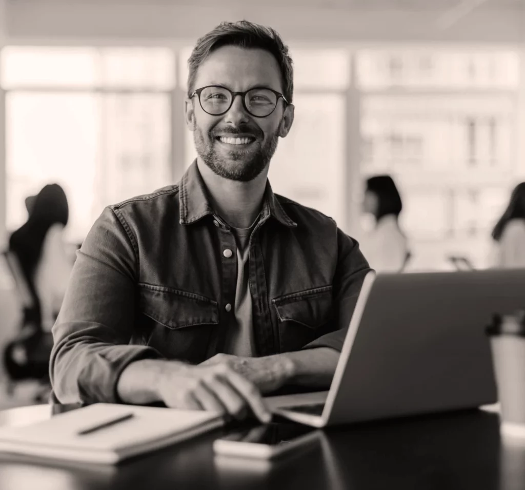 Portrait of a business man sitting in the office